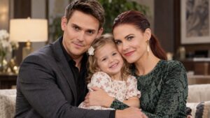 Adam and Sally hug Ava